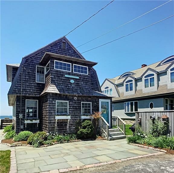Exquisite Groton Long Point home steps from the water.